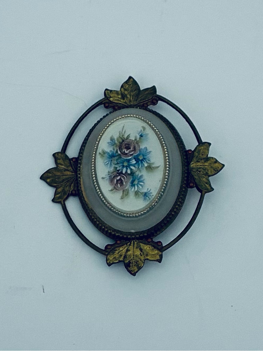Vintage Oval Brooch Hand-painted Floral Center Piece Metal Frame Leaf Accents